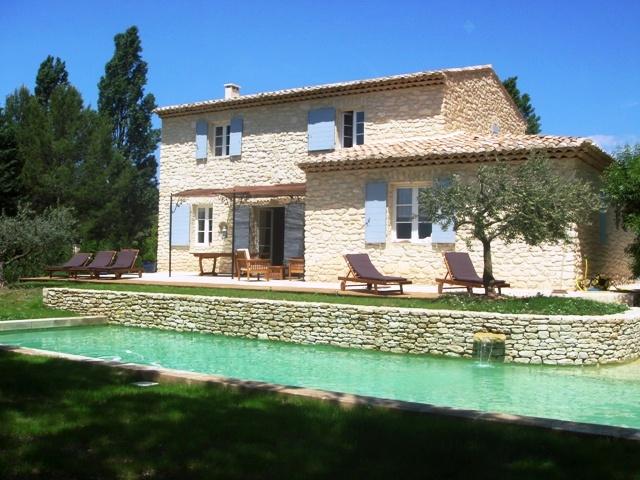 Near Gordes, in Luberon, large stone built villa with landscaped garden and swimming pool